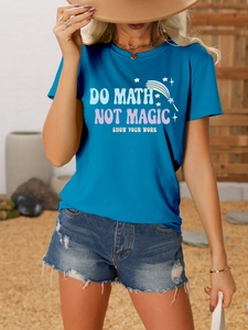Close-up of bright blue T-shirt with Do Math Not Magic Show Your Work printed slogan