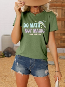 Green T-shirt with 'Do Math Not Magic' print paired with denim shorts and sun hat