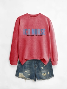 Detail of ICU NURSE printed crewneck sweatshirt with blue intensive care unit text