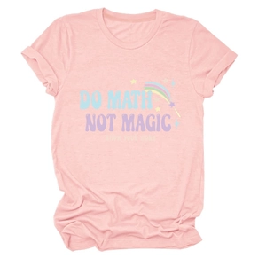 Detailed flat lay of pink cotton T-shirt featuring DO MATH NOT MAGIC rainbow graphic print