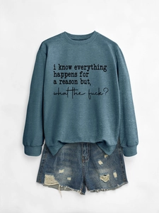 Detail of teal crewneck sweatshirt with 'i know everything happens for a reason' print