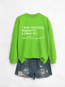 Detail of neon green crewneck sweatshirt with 'everything happens for a reason' slogan