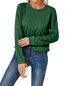 Detail of dark green heather long sleeve t-shirt paired with washed blue denim jeans
