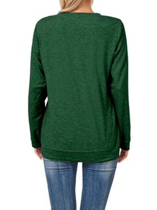 Back view of a long-sleeve dark green crewneck top with soft marled texture and casual fit