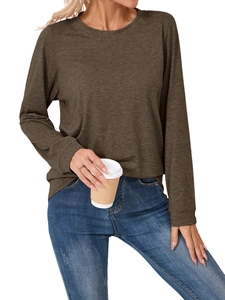 Detail view of coffee brown long sleeve knit top showing fabric texture and crew neck design