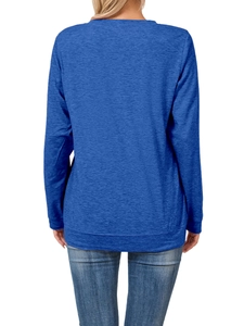 Detail showing the gray knit fabric texture and raglan sleeves of this blue long sleeve tee
