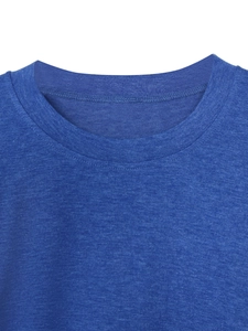 Close-up of the ribbed crew neck and double-needle stitching on the blue cotton t-shirt