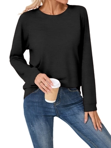 Detail of soft black long-sleeve T-shirt fabric texture and casual crewneck design