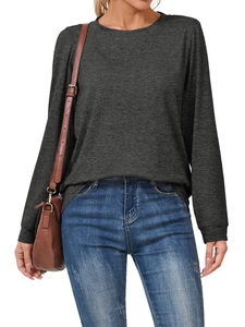 Close-up of charcoal grey long sleeve T-shirt showing knit texture and ribbed cuffs