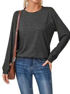 Detail of dark grey long sleeve crewneck top showing brushed knit fabric and ribbed cuffs