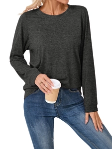 Detail of dark grey long sleeve knit top with ribbed cuffs and soft cotton texture