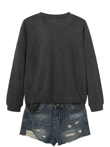 Flat lay of a dark grey long sleeve sweatshirt paired with distressed blue denim shorts
