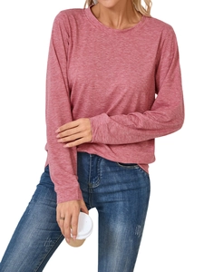 Close-up of the breathable knitted fabric and round neckline on a mauve long-sleeve tee