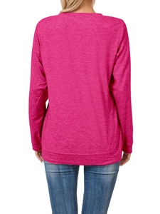 Back view of magenta long sleeve crewneck top paired with blue washed denim jeans