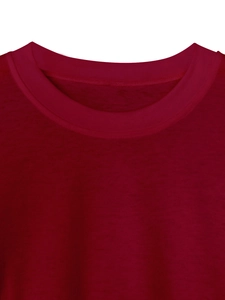 Close-up of ribbed crewneck and fine knit texture on burgundy long sleeve T-shirt