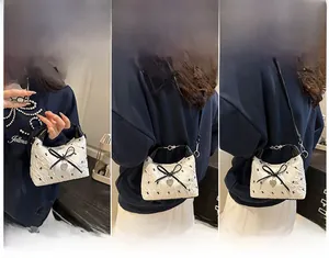 Detailed views of pink ballet-style bag showing handbag, crossbody, and shoulder wear modes