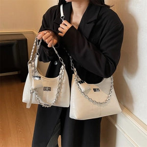 White patent leather hobo shoulder bag with silver chain and mini coin pouch