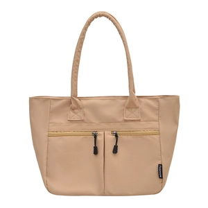 Minimalist beige nylon tote bag featuring front dual zipper pockets and fashion tag