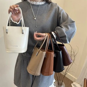 Fashion minimalist leather bucket bags in five colors with hand-carry straps