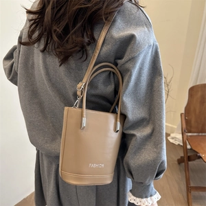 Minimalist khaki leather bucket bag for women with silver FASHION lettering