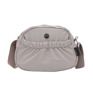 Chic pleated crossbody bag in lavender nylon with adjustable strap and metal logo