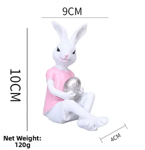 Easter resin bunny figurine with silver egg dimensions showing height 10cm and weight 120g