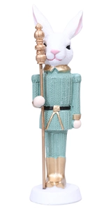 Detail of bunny soldier figurine with green knit texture and golden scepter
