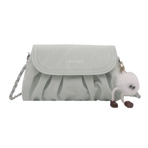 Light green pleated chain crossbody bag with cloud texture and plush charm accessory