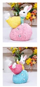 Detailed view of resin Easter bunnies with knit textures on decorative lace eggs
