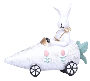 Macro detail of Easter bunny figurine driving a carrot car with fine resin texture