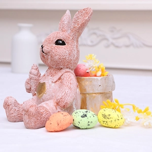 Conejo de Pascua de resina rosa con mochila y huevos de colores para mesa de hogar