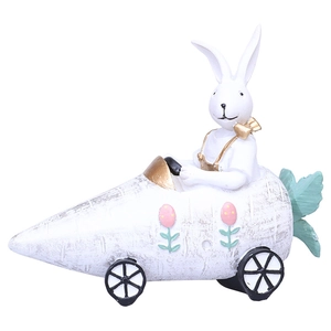 Resin Easter rabbit figurine driving a vintage carrot car with floral details