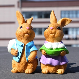 Pareja de conejos de Pascua vintage en resina para jardín con detalles realistas