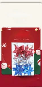 Set of shiny red, blue, and silver star ornaments with golden strings in retail packaging