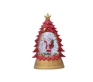 Detail of red Christmas tree lantern with Santa Claus inside and gold base