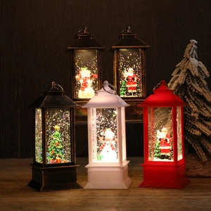 Christmas lanterns with LED glitter snow and festive Santa designs for holiday table decor