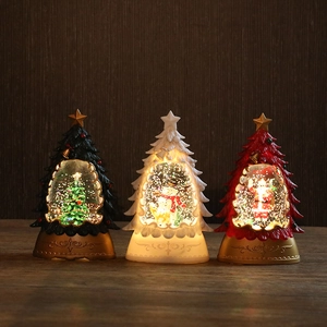 Lighted Christmas tree water lanterns with santa snowman scenery in three colors
