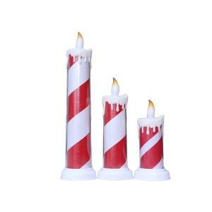 Three-piece set of red and white striped LED Christmas candle lights with warm glow