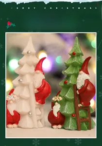 Detailed view of resin Christmas gnomes climbing trees with a warm bokeh light background