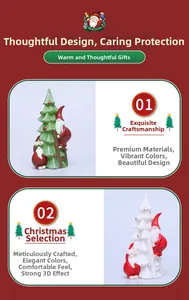 Detailed view of hand-painted resin Christmas tree with climbing Santa Claus ornaments