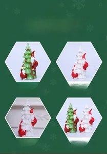Detail showing resin Christmas tree figurines with Santa Claus and silver bead ornaments