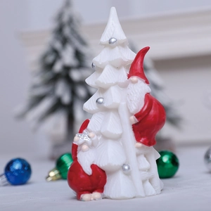 Handcrafted Christmas gnome climbing white resin tree figurine for festive tabletop decor