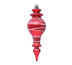 Close-up of red teardrop Christmas ornament with white glitter spiral details