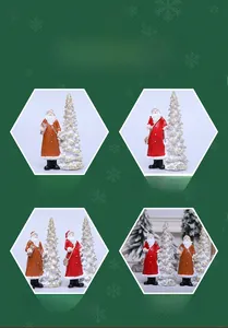Detail of Santa Claus figurines with snow-covered Christmas trees for holiday home decor