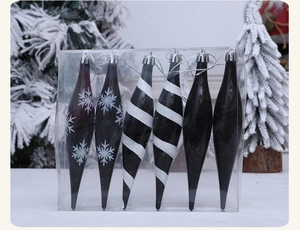 Detalle de 6 colgantes navideños de gota negros con copos plateados y diseño de espiral