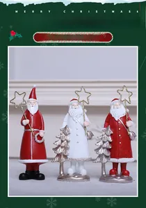 Detailed view of three resin Santa Claus figurines with golden star staves and glitter finish