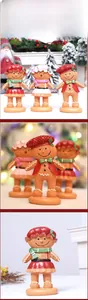 Detailed view of resin gingerbread man figurines with realistic cookie texture and cozy decor