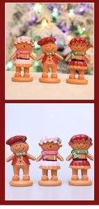 Detailed close-up of three gingerbread man resin figurines with knitted texture details