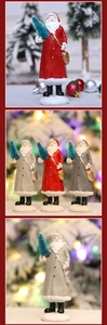 Detailed trio of Santa Claus resin figurines with mini flocked trees for holiday decor