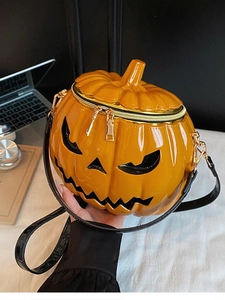 3D pumpkin shaped shoulder bag in glossy orange patent leather for Halloween fashion